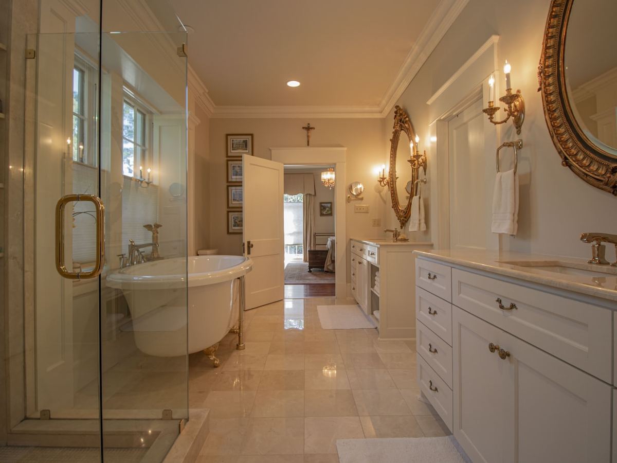 Bathroom Remodel completed in Pelham, AL. Traditional layout updated with a frameless glass enclosure.